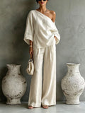 Elegant Off-shoulder Top And Loose Wide-leg Pants Set In A Relaxed, Laid-back Style